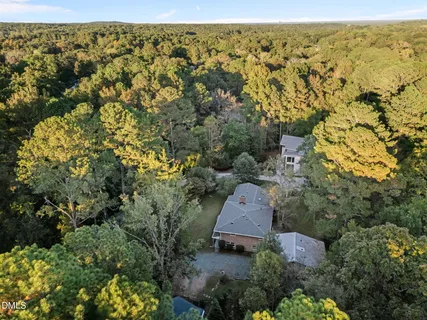 a view of balcony with furniture and wooden deck