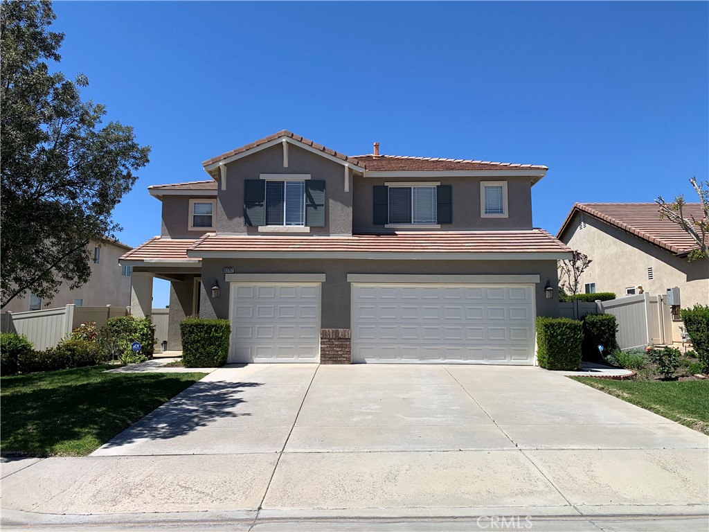 a house view with a outdoor space