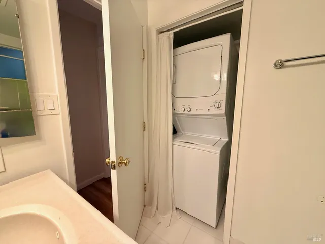 a bathroom with a sink a toilet and tub