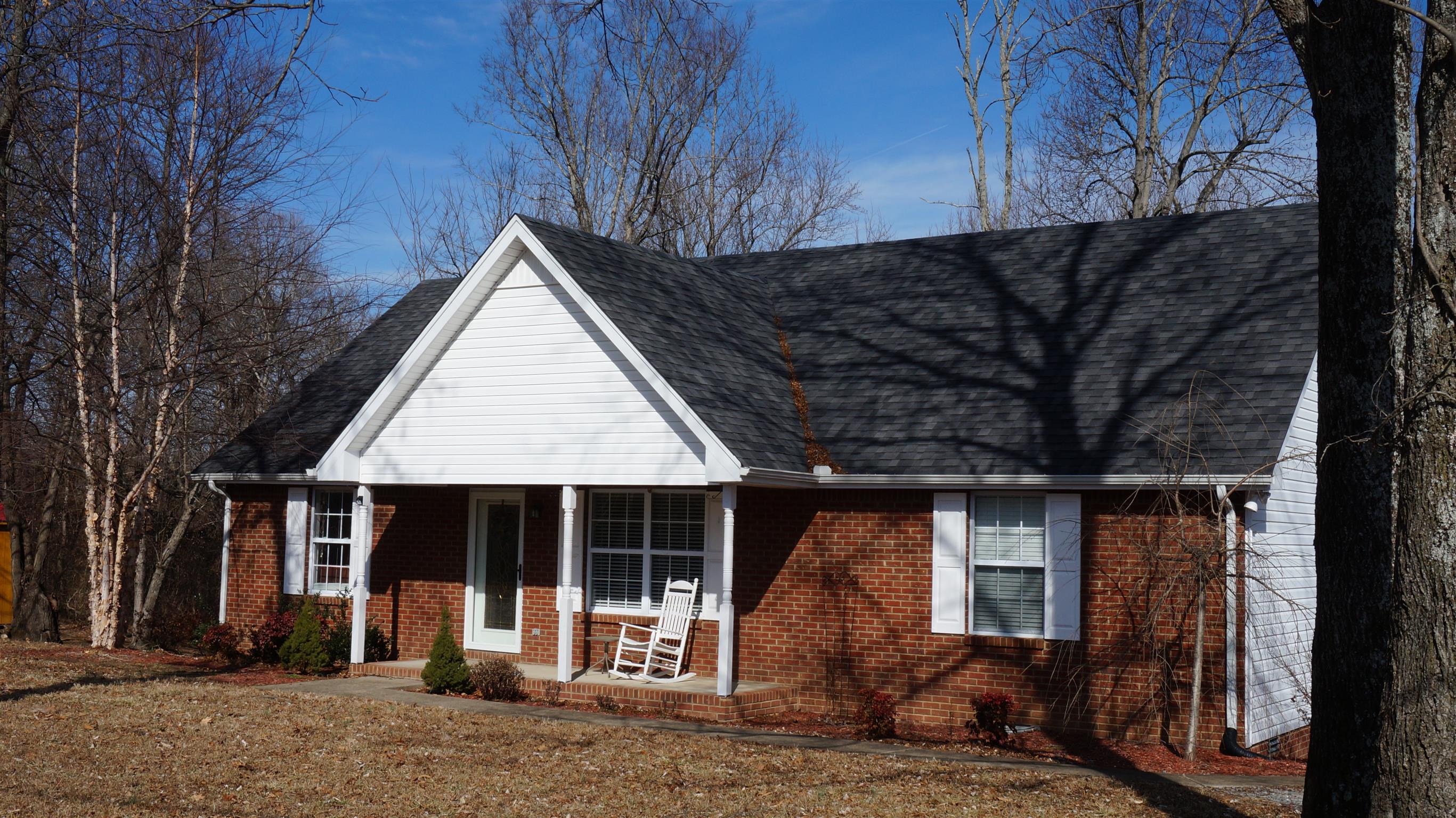 7558 South Swift Road Goodlettsville, TN 37072 - Photo 18 of 18 a view of a house with a small yard and wooden fence