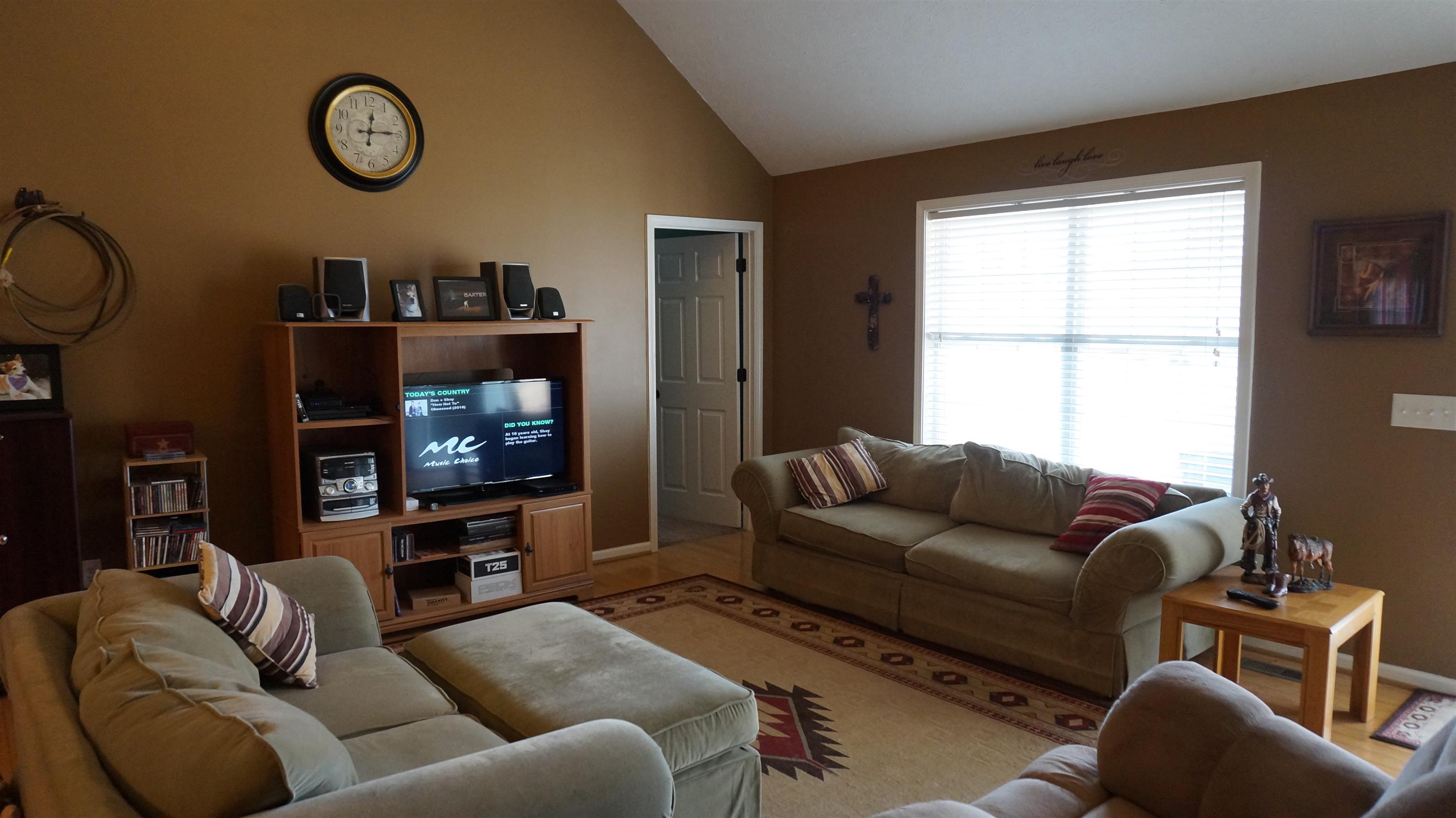 7558 South Swift Road Goodlettsville, TN 37072 - Photo 3 of 18 a living room with furniture a window and a flat screen tv