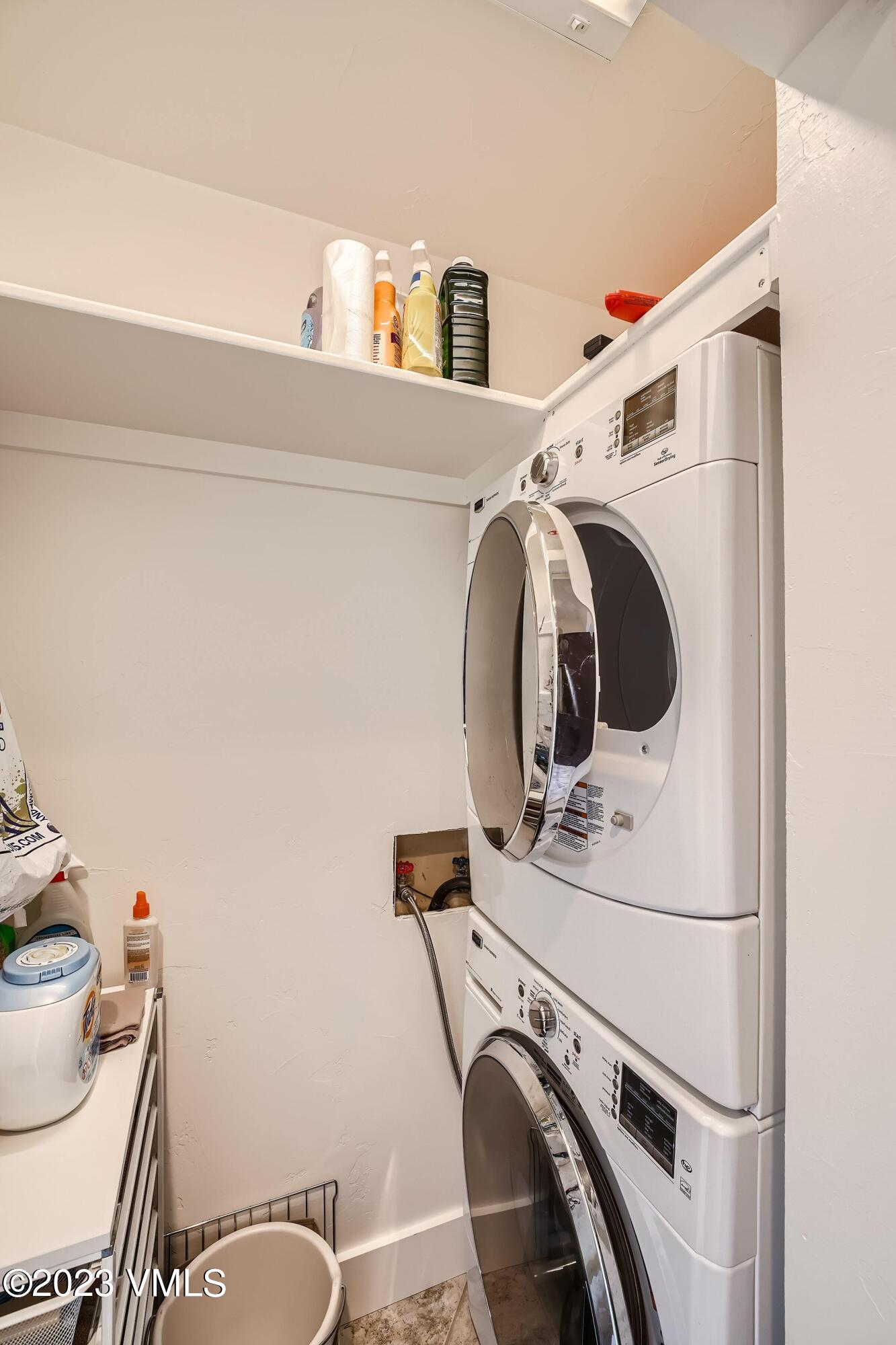 1030 Lions Ridge Loop, Unit 202 Vail, CO 81657 - Photo 21 of 25 a utility room with dryer and washer