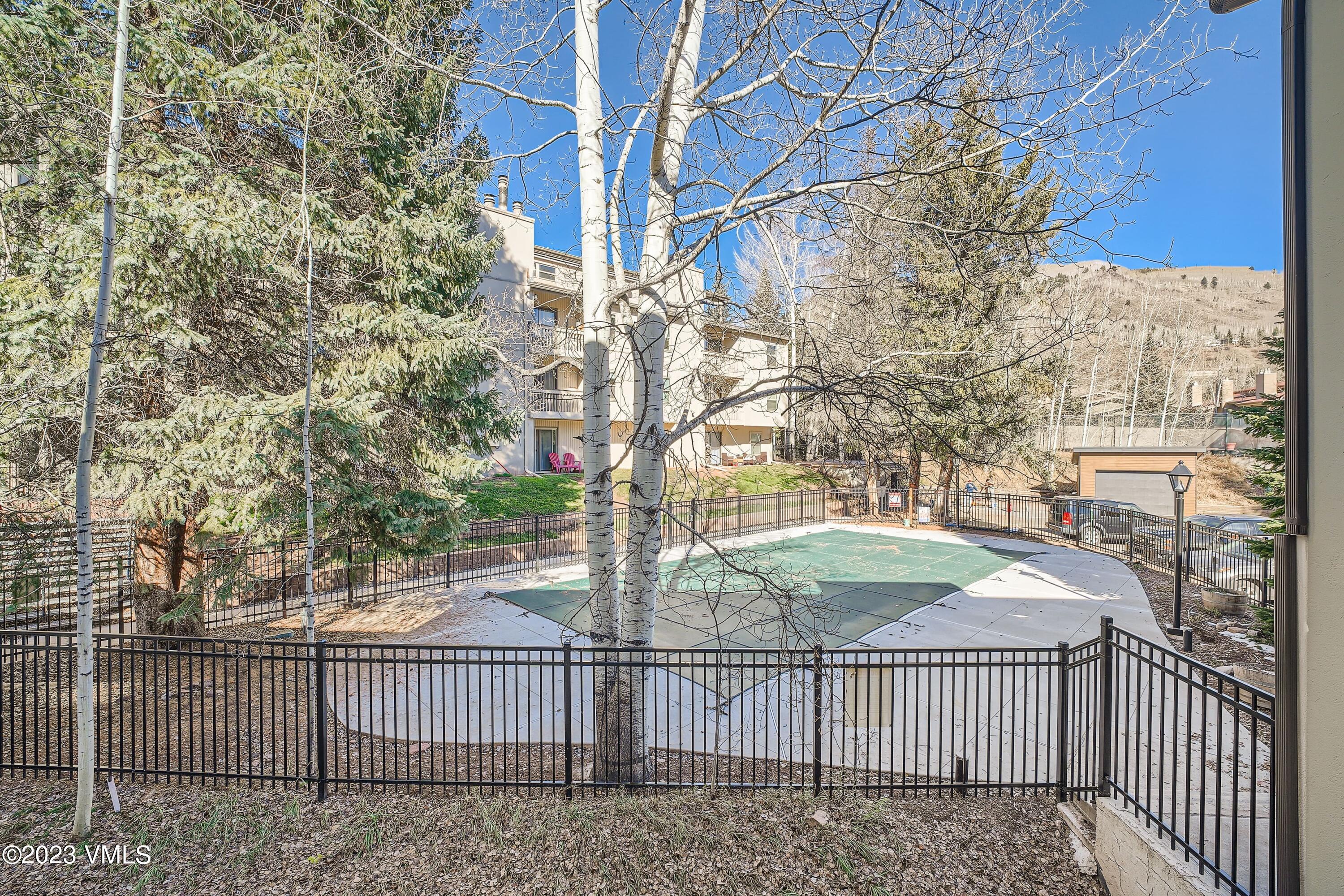 1030 Lions Ridge Loop, Unit 202 Vail, CO 81657 - Photo 23 of 25 a view of a gate and fence