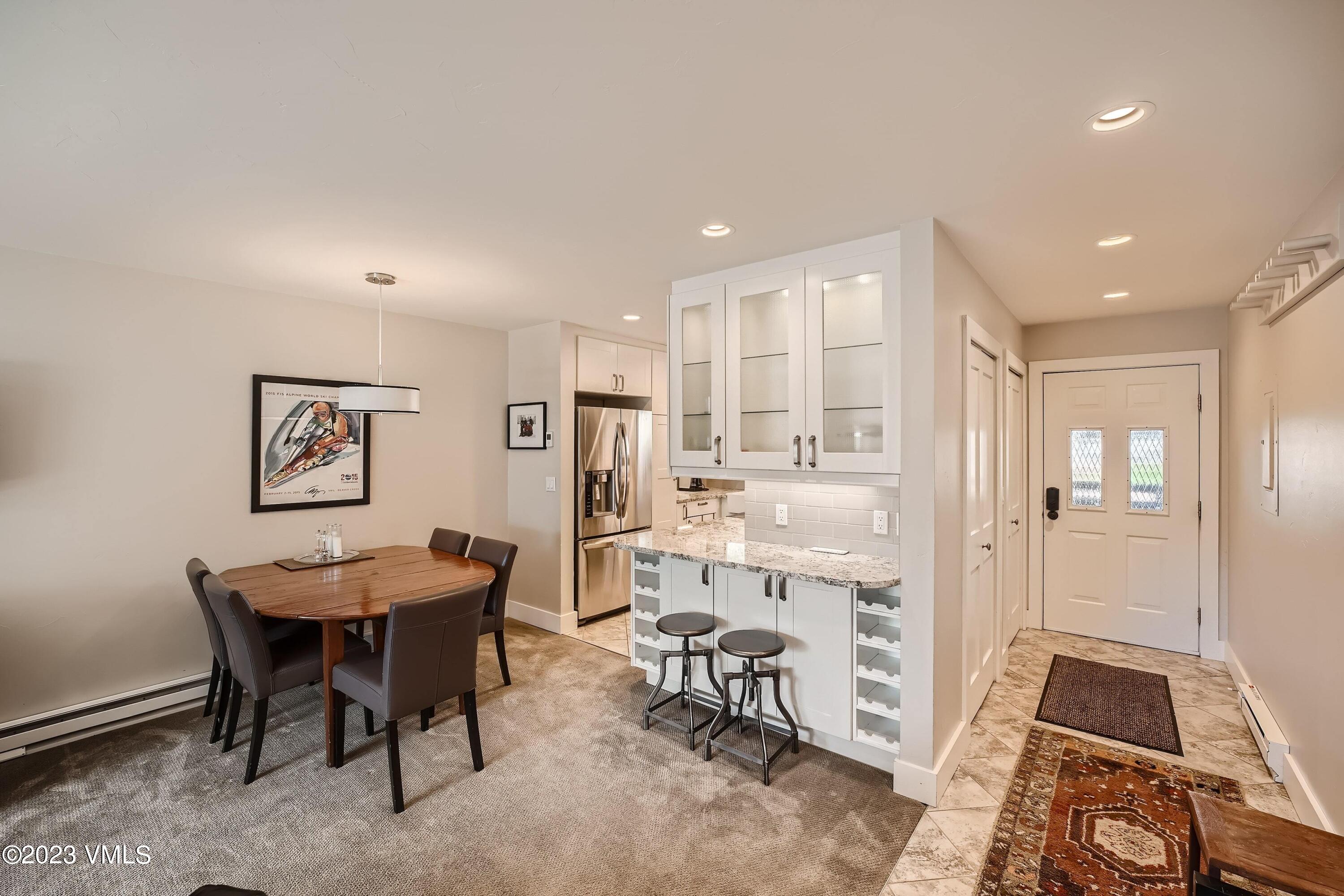 1030 Lions Ridge Loop, Unit 202 Vail, CO 81657 - Photo 6 of 25 a view of a dining room with furniture