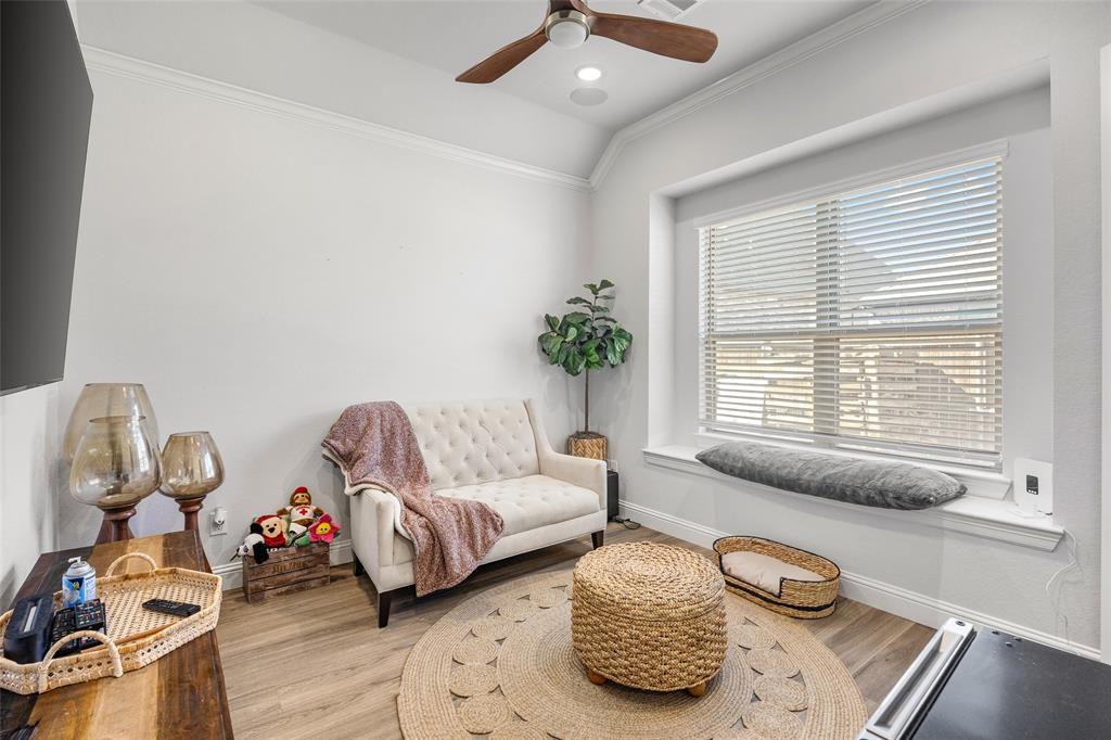 2628 Flycatcher Road Fort Worth, TX 76118 - Photo 22 of 38 Sitting room with ornamental molding, wood finished floors, recessed lighting, and ceiling fan