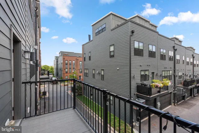 a front view of a house with garage