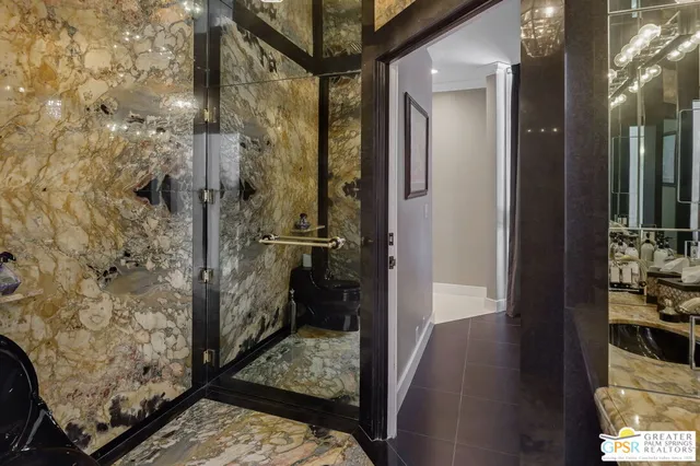 a bathroom with a sink and shower