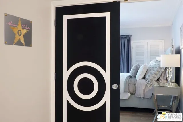 a view of a house with outdoor space and palm tree