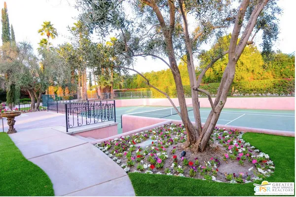 a view of a water fountain in a backyard