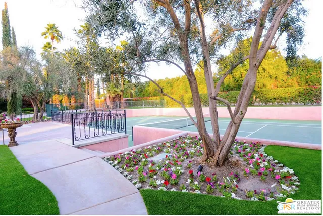 a view of a water fountain in a backyard