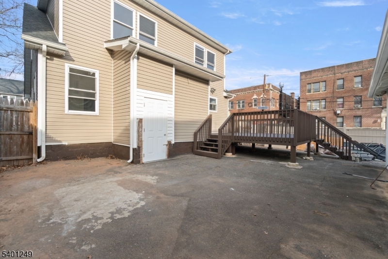 390 Clinton Place Newark, NJ 07112 - Photo 17 of 17 a view of a house with a backyard