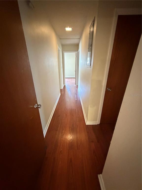 517 London Road Winter Park, FL 32792 - Photo 12 of 13 a view of a hallway with wooden floor