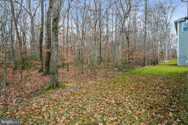 a view of a house with a street