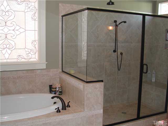 7822 Monument Lane Raleigh, NC 27615 - Photo 9 of 12 Master Bath whirlpool and Shower