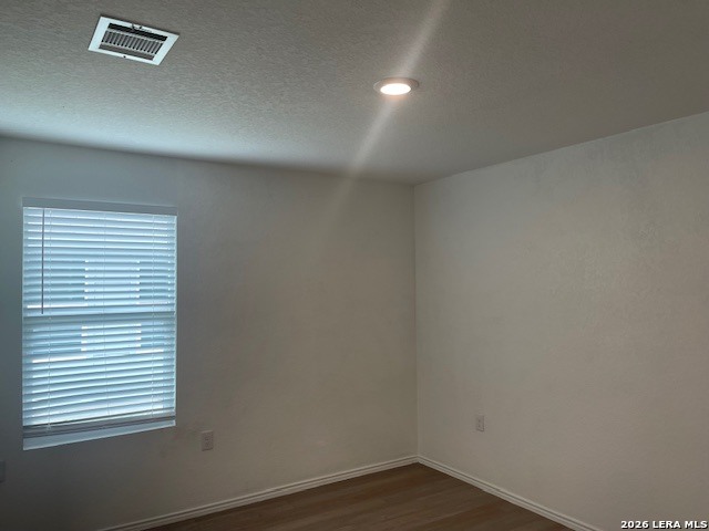 918 Cook Bend San Antonio, TX 78221 - Photo 11 of 21 an empty room with a window