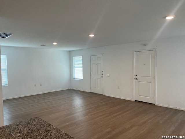 918 Cook Bend San Antonio, TX 78221 - Photo 16 of 21 a view of an empty room with wooden floor