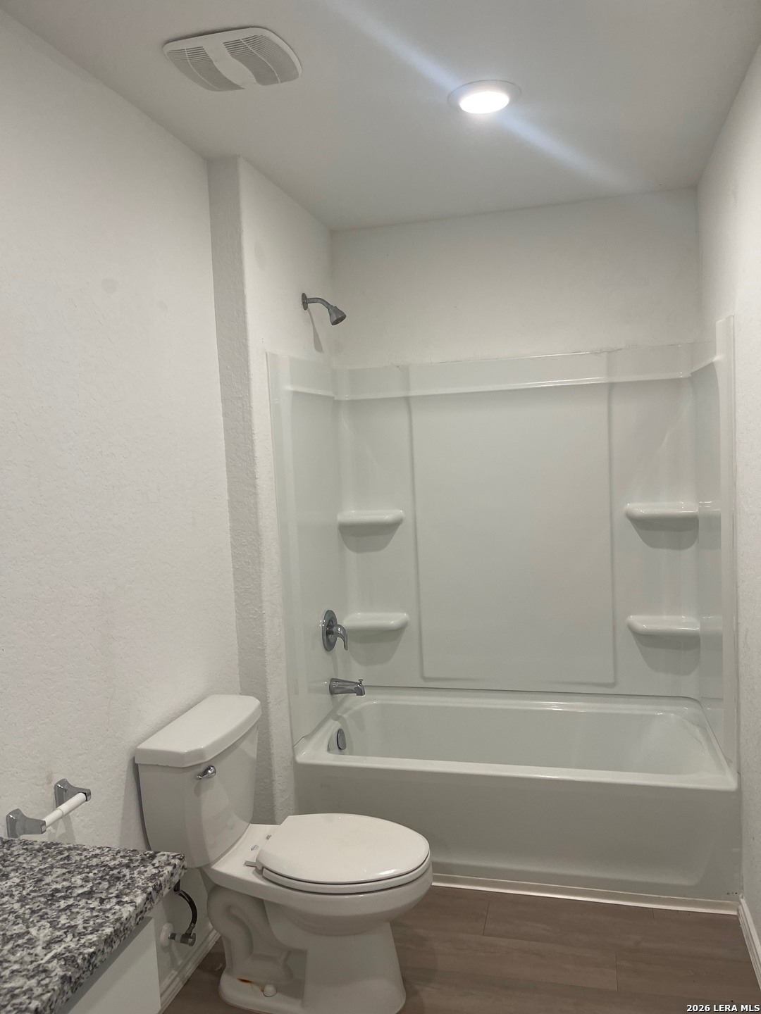 918 Cook Bend San Antonio, TX 78221 - Photo 10 of 21 a bathroom with a toilet and a bathtub