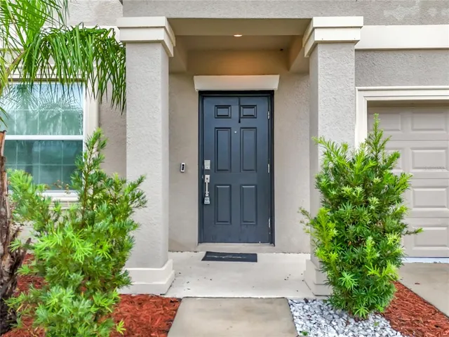 a view of a livingroom with furniture and an window