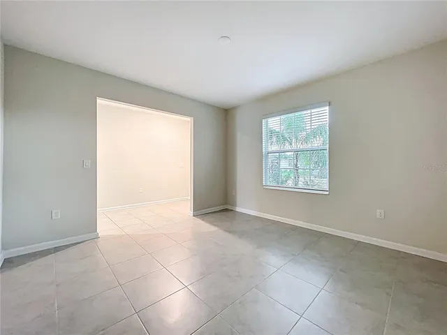 a kitchen with stainless steel appliances granite countertop a stove and a microwave