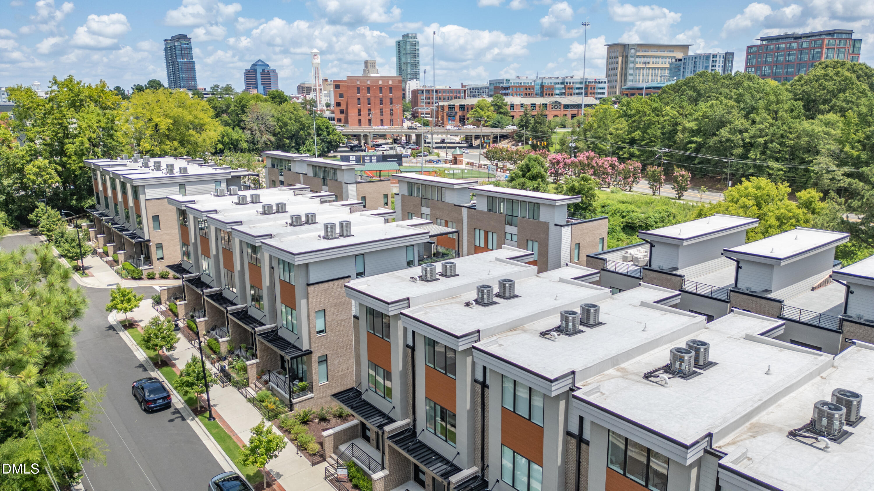 779 Willard Street Durham, NC 27701 - Photo 2 of 32 a view of a city with tall buildings