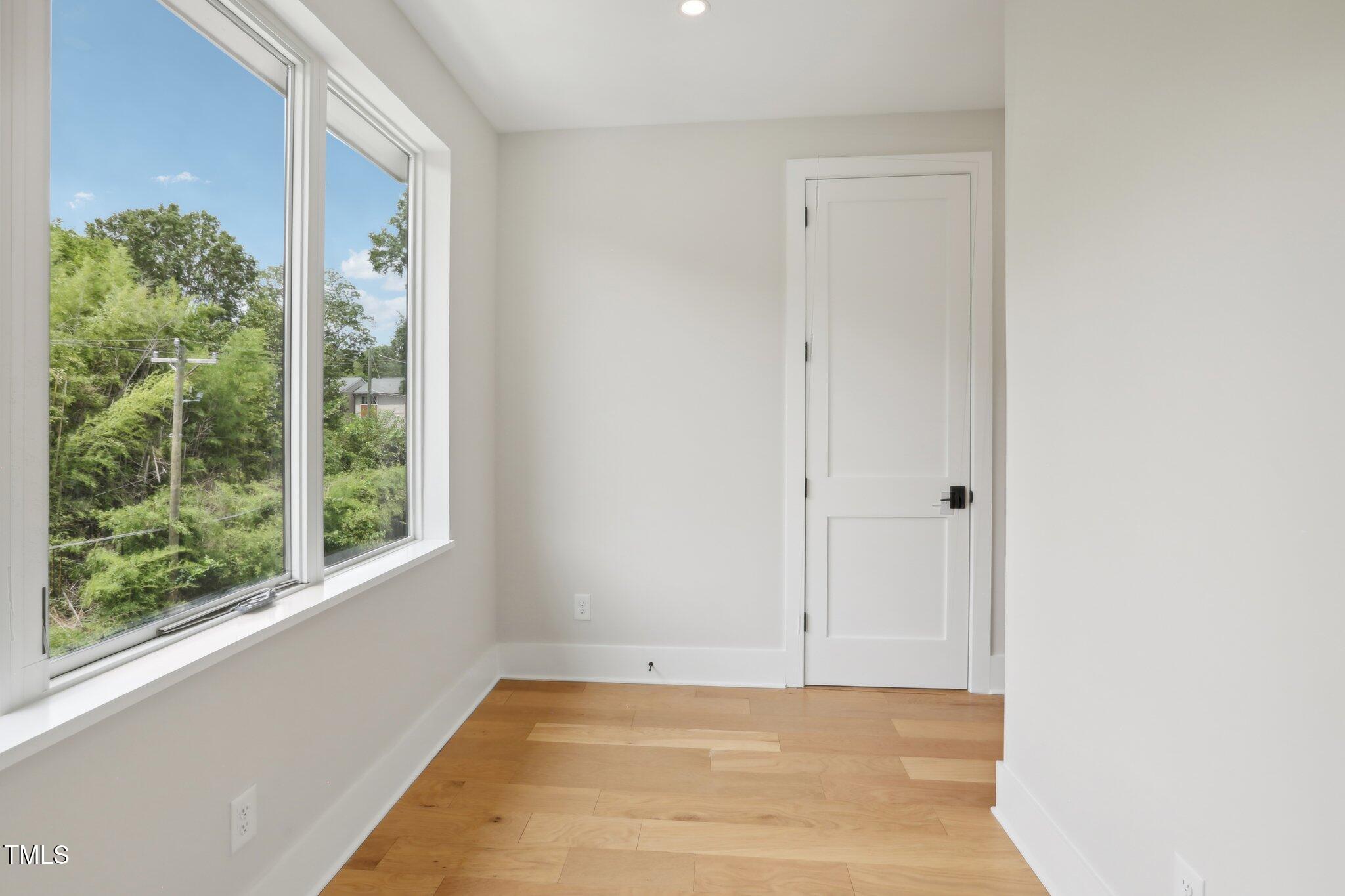 779 Willard Street Durham, NC 27701 - Photo 24 of 32 a view of a room with a large window