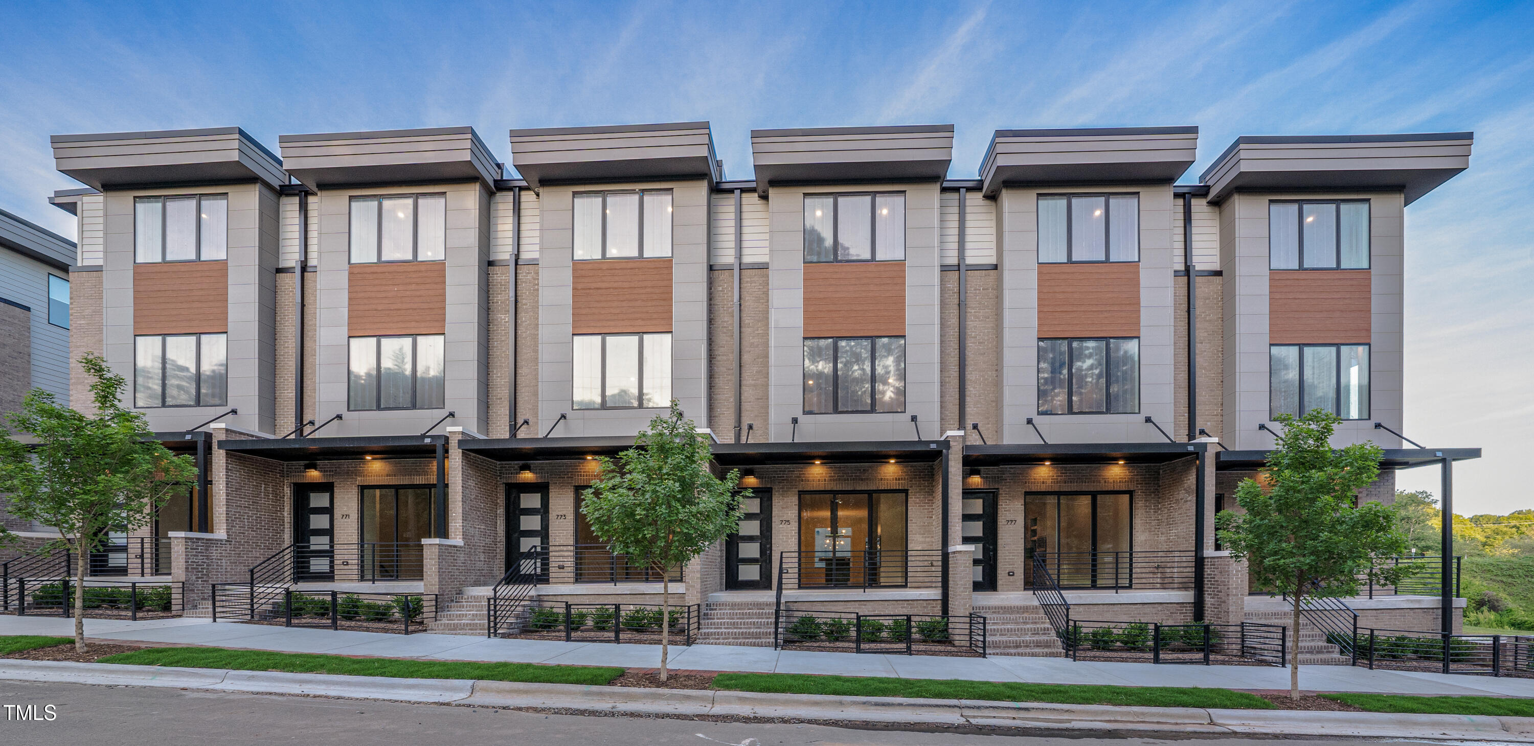 779 Willard Street Durham, NC 27701 - Photo 3 of 32 a view of a building with a yard