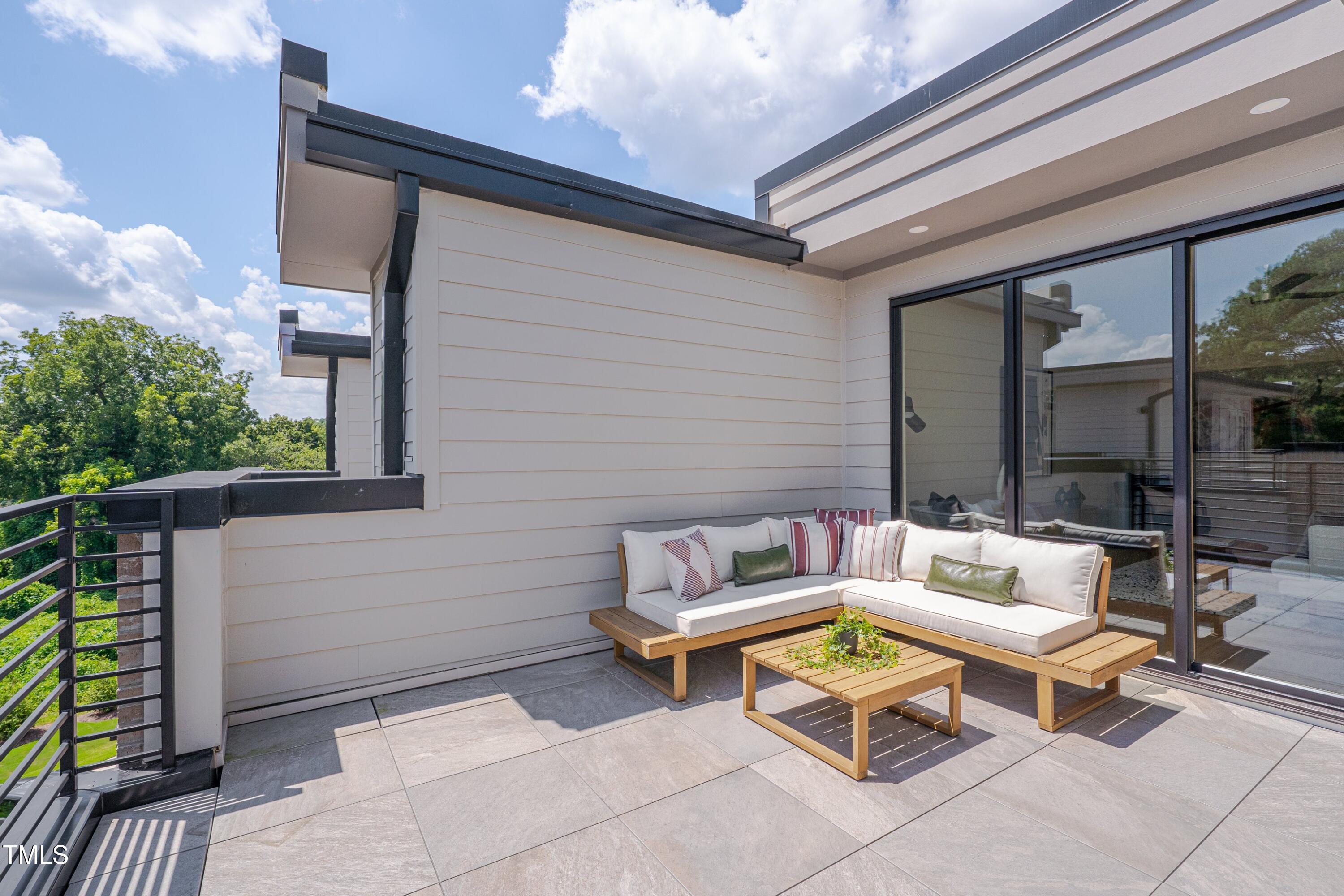 779 Willard Street Durham, NC 27701 - Photo 32 of 32 a patio with patio couch and table