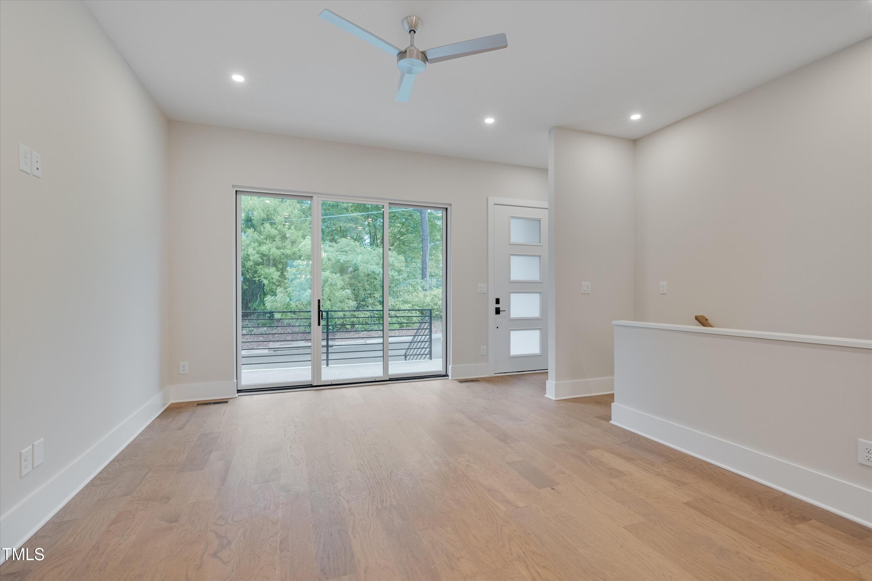 779 Willard Street Durham, NC 27701 - Photo 5 of 32 an empty room with windows and view of an empty room
