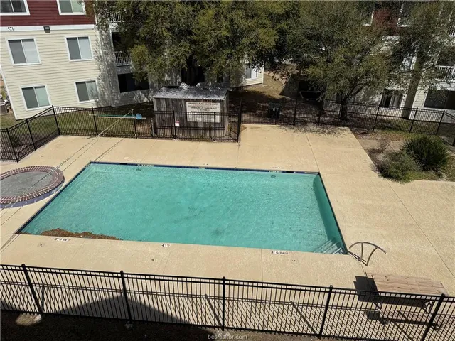 a view of a patio with couches table and chairs