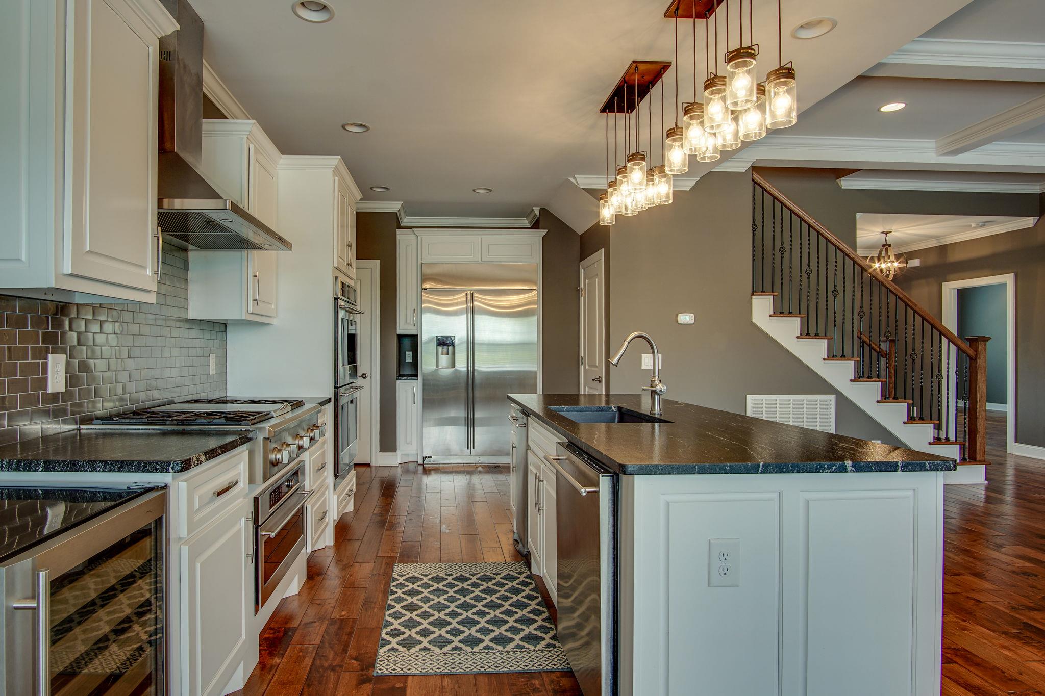 3029 Briley Path Columbia, TN 38401 - Photo 13 of 28 a kitchen with a sink and a stove top oven