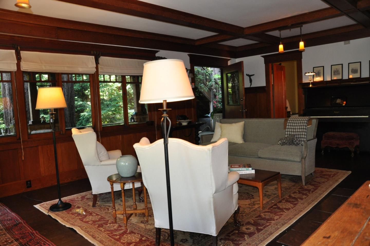 6360 Glen Haven Road Soquel, CA 95073 - Photo 11 of 50 a living room with furniture a lamp wooden floor and a large window