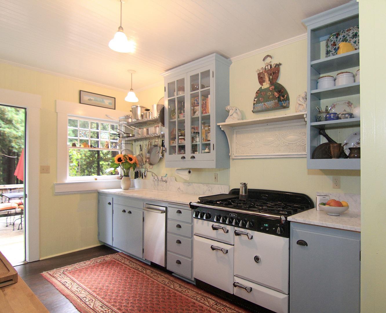 6360 Glen Haven Road Soquel, CA 95073 - Photo 14 of 50 a kitchen with granite countertop a stove and a sink