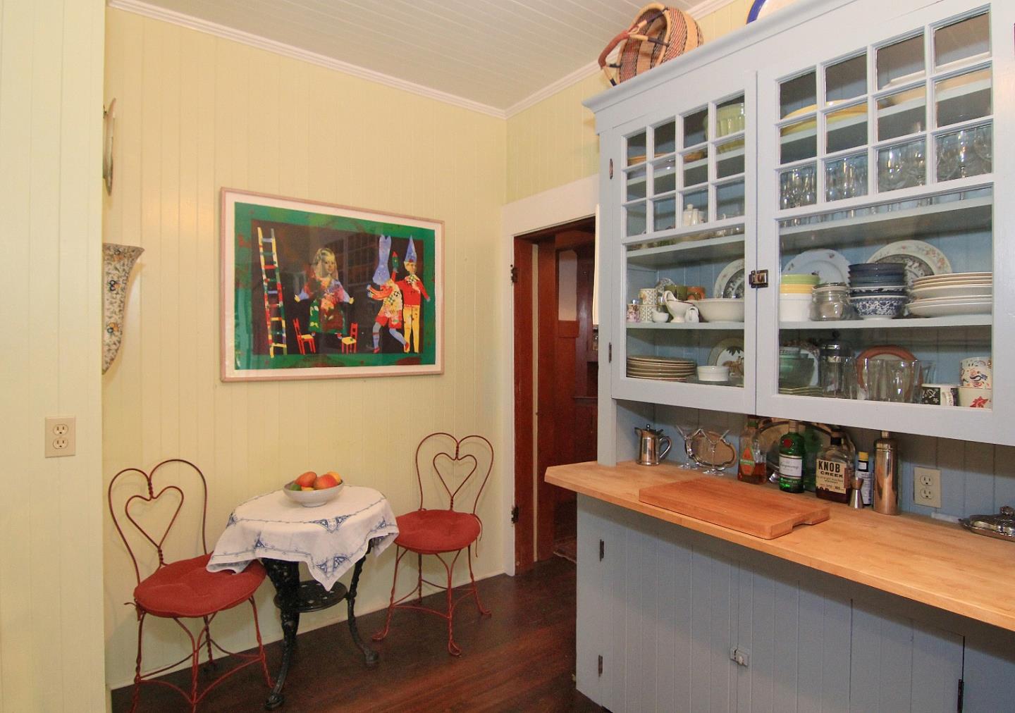 6360 Glen Haven Road Soquel, CA 95073 - Photo 16 of 50 a dining room with furniture and wooden floor