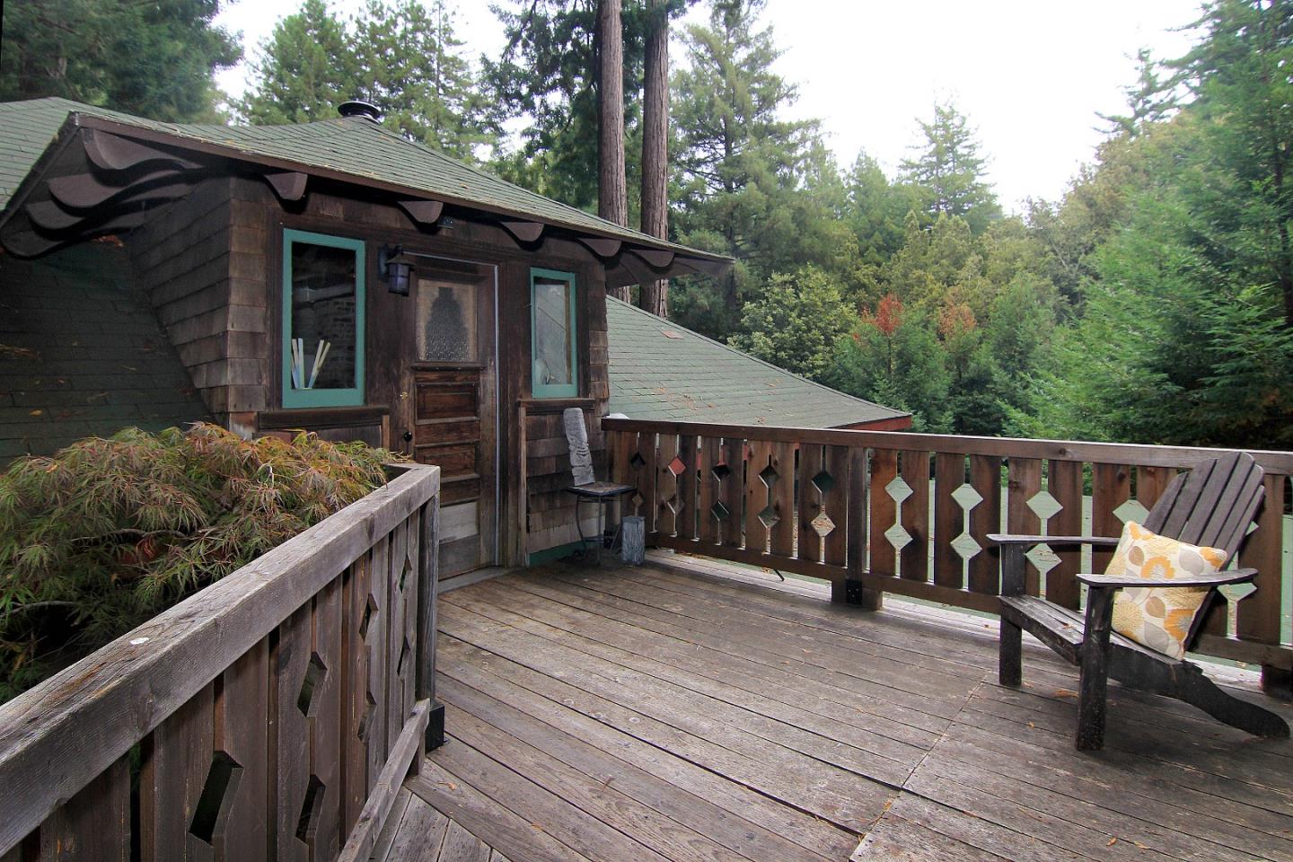 6360 Glen Haven Road Soquel, CA 95073 - Photo 31 of 50 a view of wooden deck and a backyard