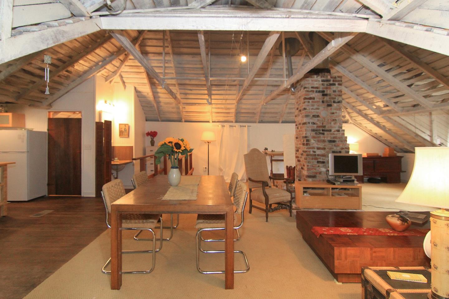 6360 Glen Haven Road Soquel, CA 95073 - Photo 33 of 50 a dining room with stainless steel appliances kitchen island granite countertop a table and chairs