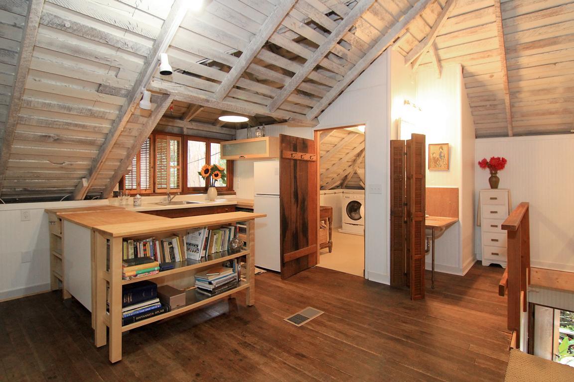 6360 Glen Haven Road Soquel, CA 95073 - Photo 37 of 50 a bedroom with a bed and a large window