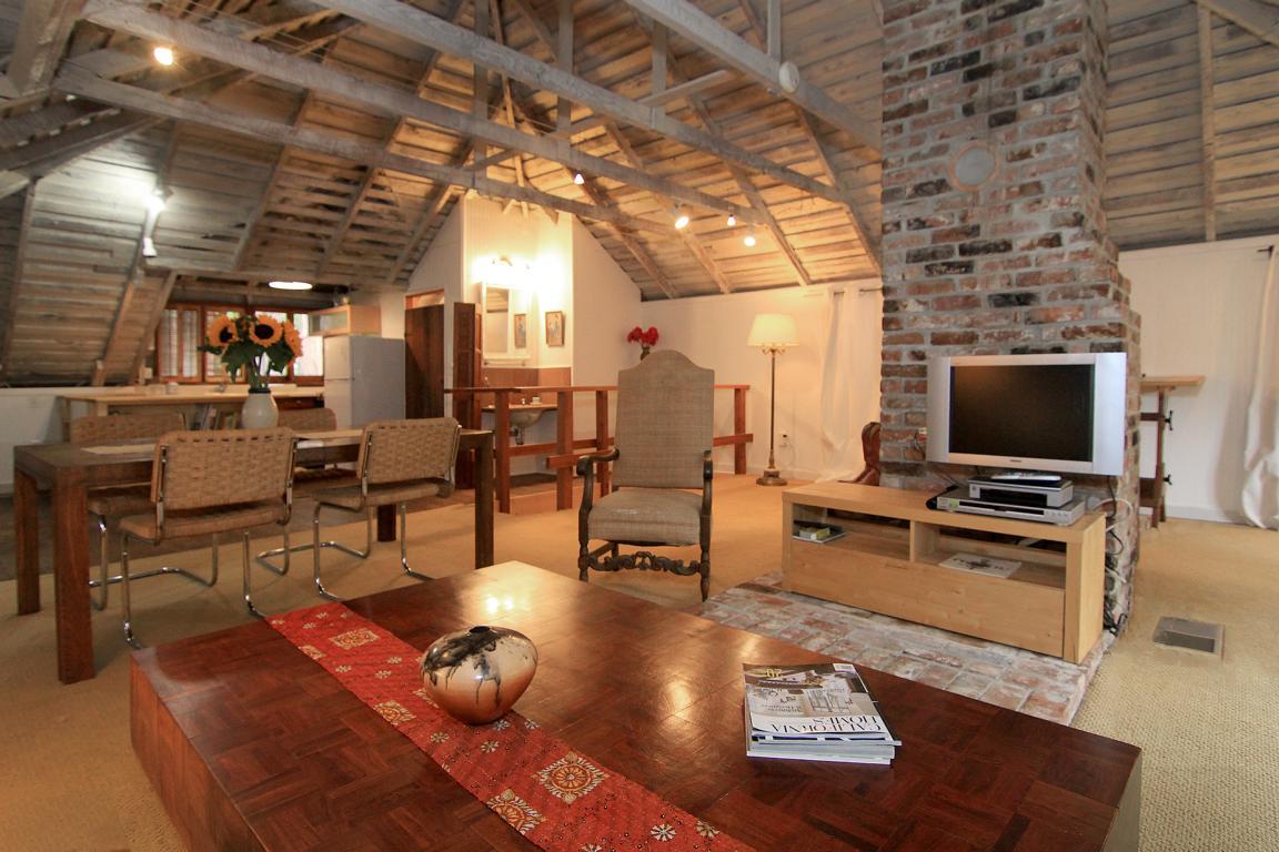 6360 Glen Haven Road Soquel, CA 95073 - Photo 38 of 50 a living room with furniture and a flat screen tv