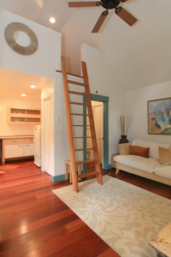 6360 Glen Haven Road Soquel, CA 95073 - Photo 50 of 50 a bedroom with a bed and wooden floor