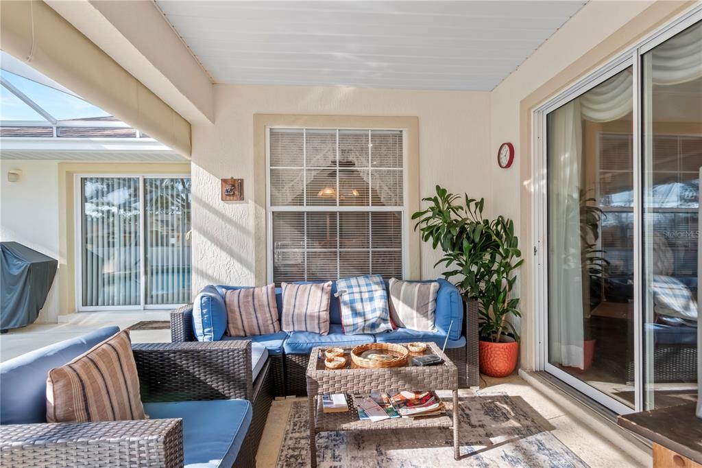 67 Lake Diamond Boulevard Ocala, FL 34472 - Photo 24 of 32 a living room with furniture and a potted plant