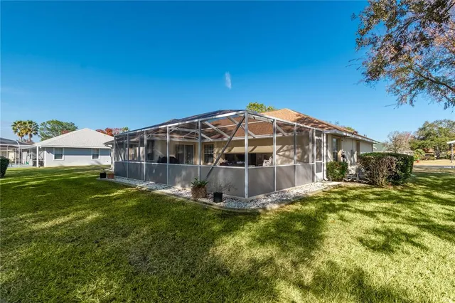 a view of a house with a big yard