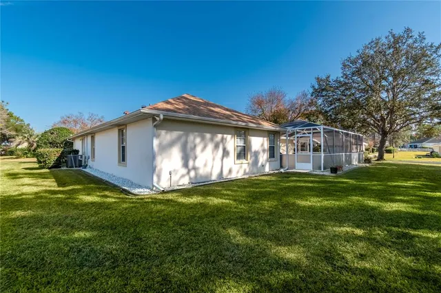 a view of a house with a big yard