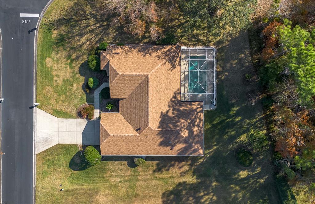 67 Lake Diamond Boulevard Ocala, FL 34472 - Photo 29 of 32 a picture of a tree in front of building