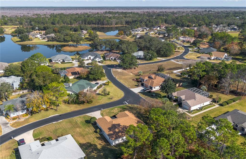 67 Lake Diamond Boulevard Ocala, FL 34472 - Photo 31 of 32 an aerial view of residential houses with outdoor space