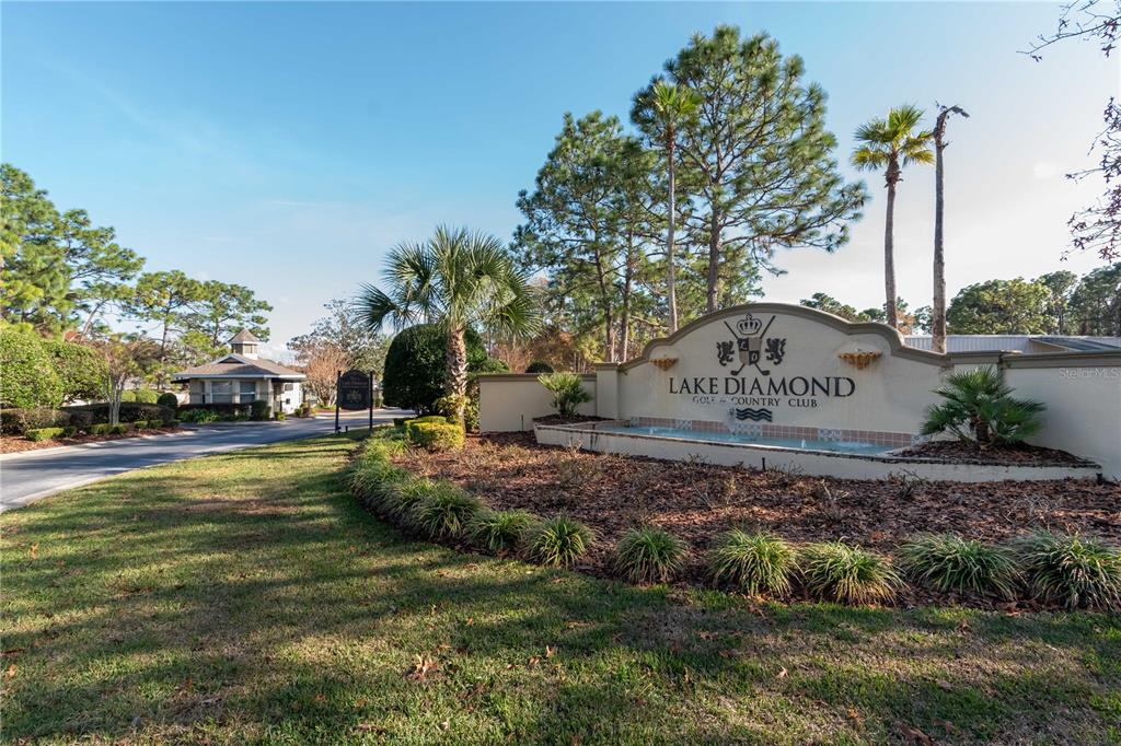 67 Lake Diamond Boulevard Ocala, FL 34472 - Photo 32 of 32 a view of a park along trees