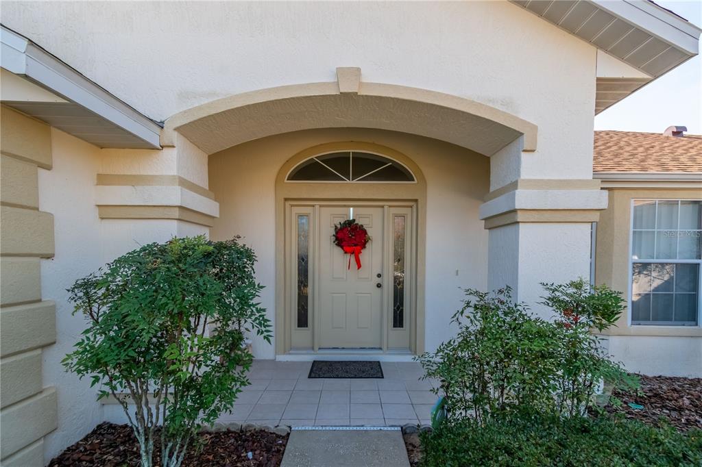 67 Lake Diamond Boulevard Ocala, FL 34472 - Photo 4 of 32 a view of front door of house