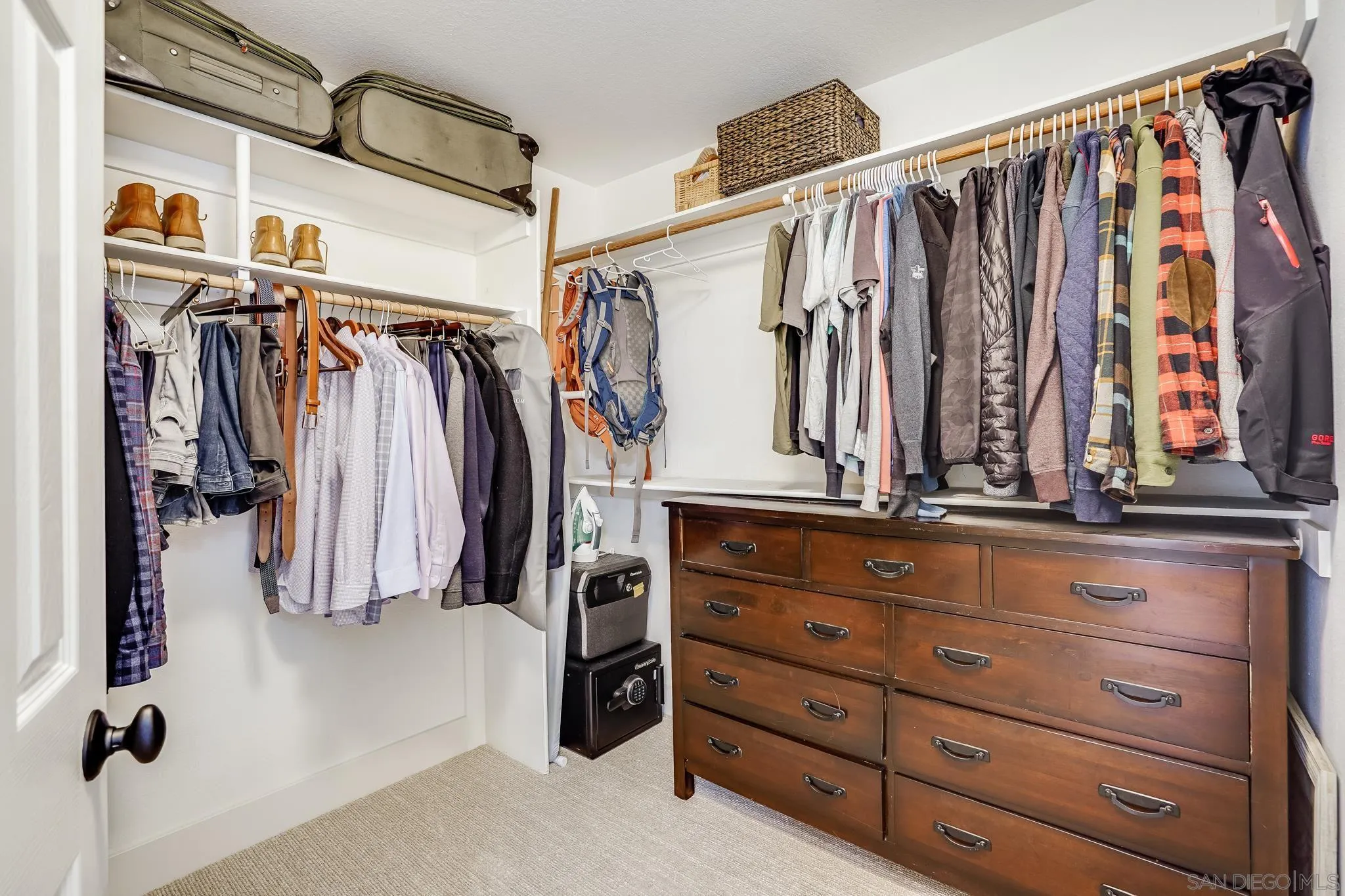 1126 Alexandra Lane Encinitas, CA 92024 - Photo 24 of 36 a view of walk in closet with clothes