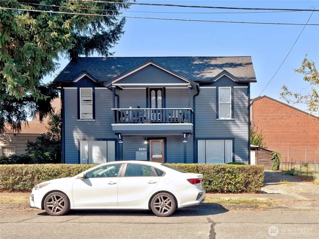 a car parked in front of a house
