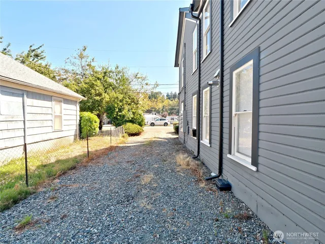 a view of a back yard of the house