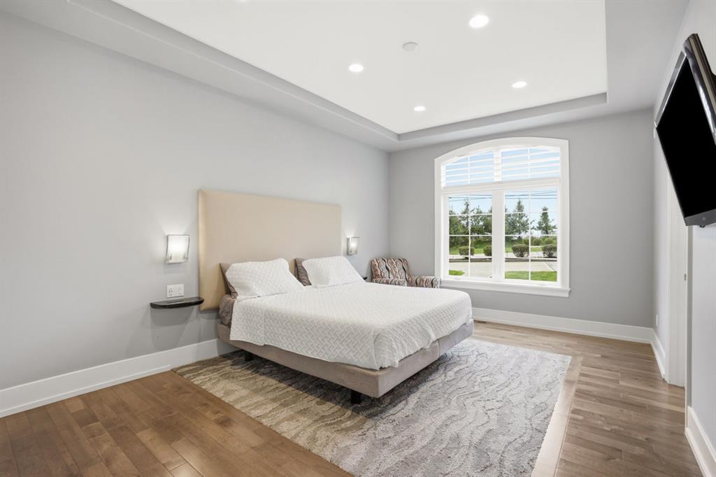 931 Pleasant Hill Road Wexford, PA 15090 - Photo 27 of 50 a large bedroom with a bed and a window