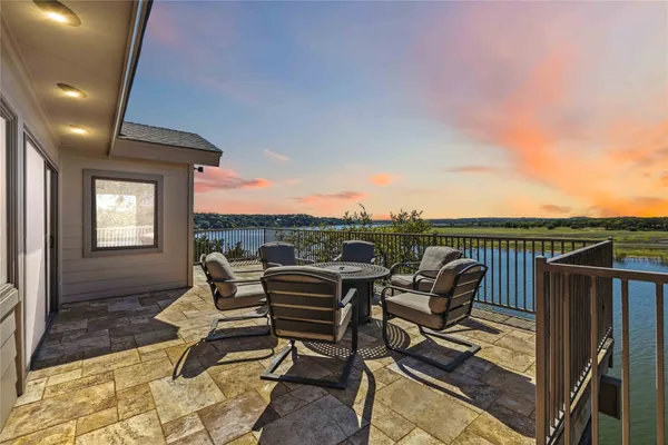 a view of a terrace with furniture